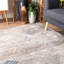 Tapis gris / bleu / orange à motif géométrique Guidry-1724165822