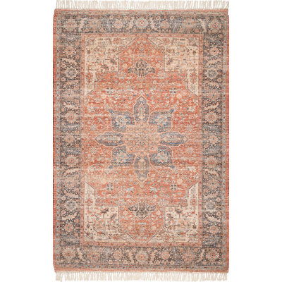 Tapis persan médaillon à pampilles