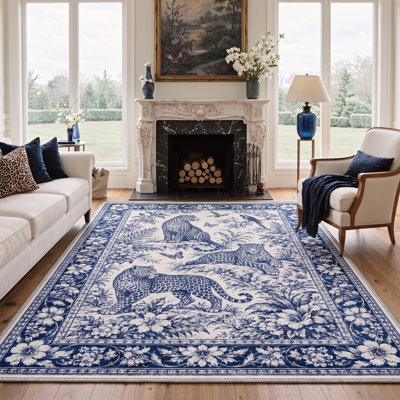 Tapis lavable à la machine à motif animalier bleu marine/ivoire avec envers antidérapant