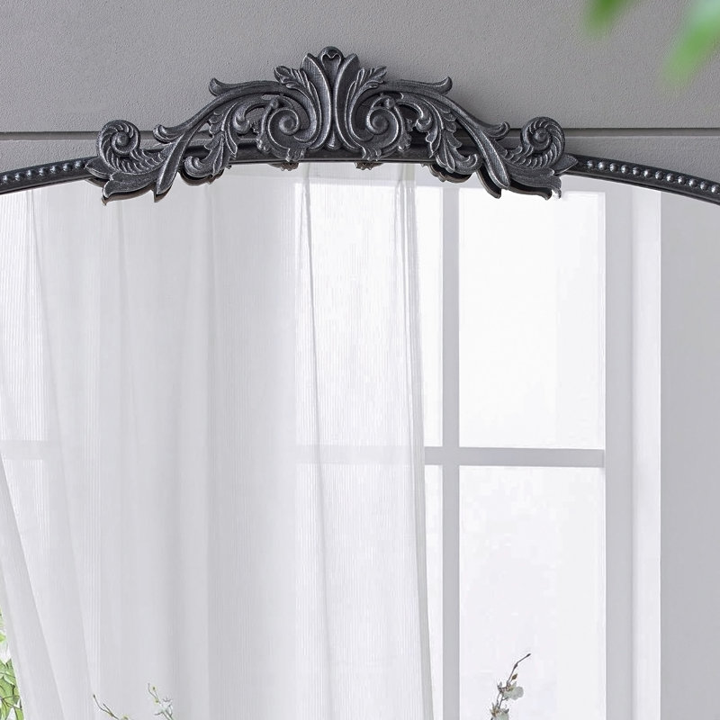 Miroir arqué et cadre d'inspiration baroque