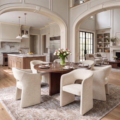 Ensemble de salle à manger rond de 7 pièces avec table à piètement central, placage de bois et fauteuils en chenille
