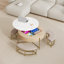 Table basse moderne à plateau relevable avec rangement et 3 repose-pieds blanc et naturel
