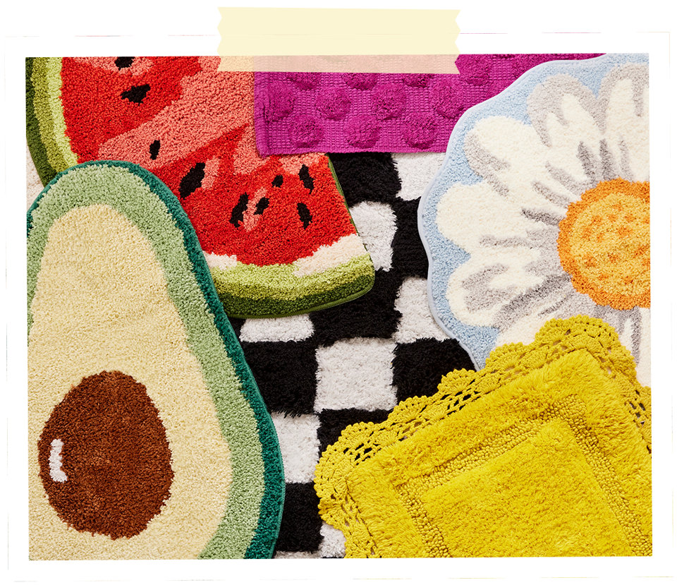 Colorful novelty bath mats featuring avocado, watermelon slice, daisy flower, checkered, and scalloped patterns.