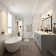 Barcelona 66.875" x 31.75" Freestanding Soaking Volcanic Limestone™ Bathtub