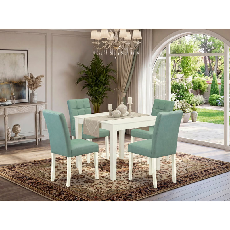 L'ensemble de table de salle à manger 5 pièces comprend une table de salle à manger et 4 chaises de cuisine en polyester vert saule, blanc lin