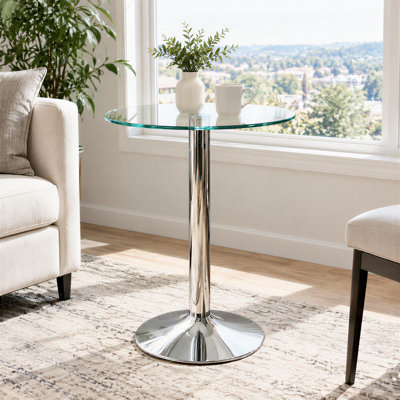 Table d'appoint en verre et métal, plateau rond en verre trempé transparent aux bords polis, pied central chromé poli, base lestée de 40 cm, diamètre 60 cm, hauteur 73 cm, finition argentée moderne