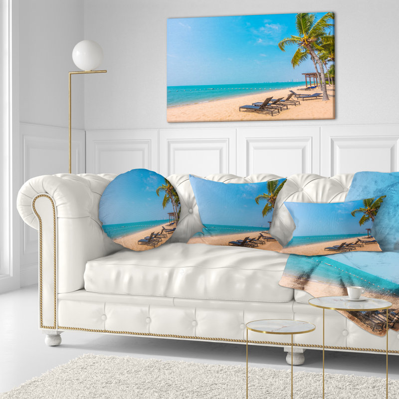 Coussin imprimé plage bleue avec palmiers