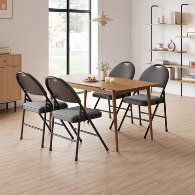 Ensemble de 4 chaises pliantes rembourrées Festisoul pour la maison et les événements. Siège et dossier en lin, structure métallique robuste, empilables, légères et confortables. Aucun montage requis pour une utilisation intérieure et extérieure. Gris foncé.
