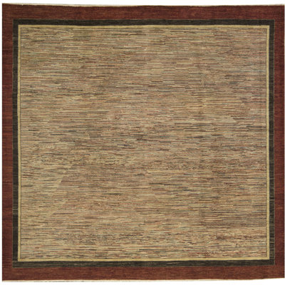 Tapis beige et rouge noué à la main de haute qualité