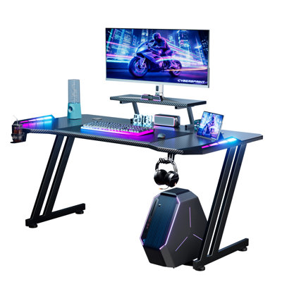 Z Shaped Ergonomic Gaming Desk with LED Lighting, Carbon Fibre Surface PC Workstation, Built-in Monitor Stand, Cup Holder & Headphone Hook for Gaming and Home Working, Black