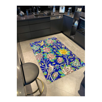 Tapis bleu tissé à rayures florales lavable à la machine