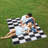 Haylee Super Lightweight Plastic Straw Rug Checkered Black/White Outdoor Area Rug-2096150272