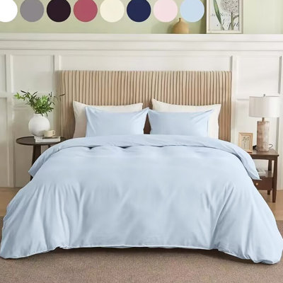 Housse de couette unie bleue en taille simple, faite d'un mélange de coton de haute qualité pour une expérience douce et respirante, avec un renforcement des bords pour éviter l'effilochage, le boulochage après des lavages répétés,