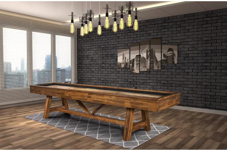 Black framed shuffleboard with a wooden tabletop.