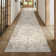 Girven Oriental Beige Area Rug