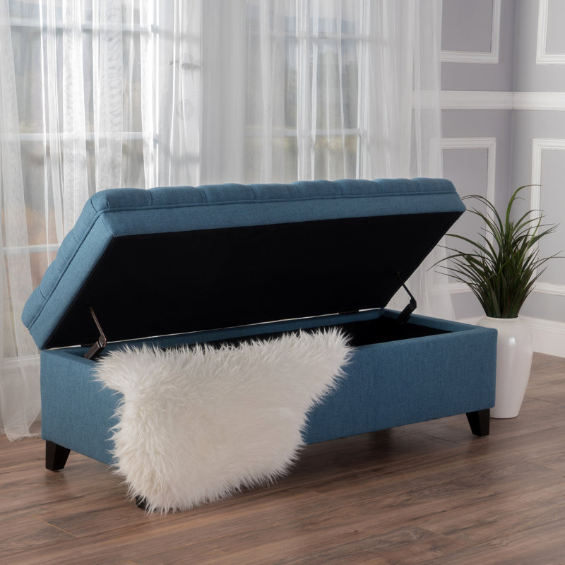 Rangement en tissu bleu avec structure stable et pieds en bouleau - Fabrication des pieds de l'accessoire de salon