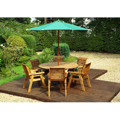 Faust 6 - Person Wood Patio Dining Set with Round Table , Cushions Included