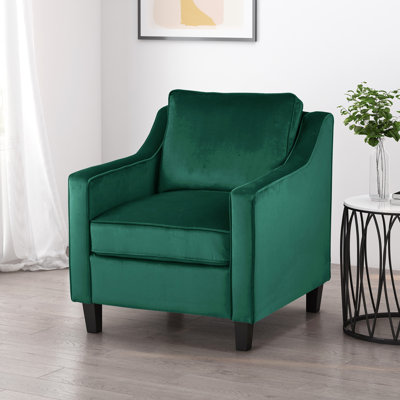 Fauteuil club en velours vert