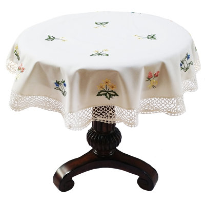 Dessus de table rond fait à la main avec fleurs brodées