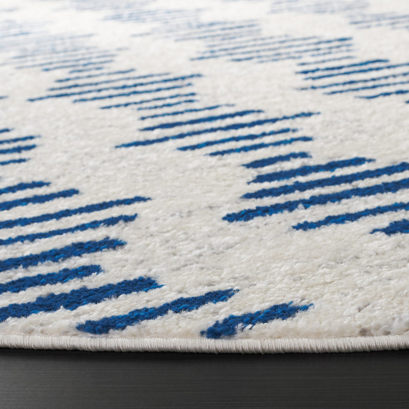 Tapis abstrait en polypropylène tissé à la machine en ivoire / bleu marine Jurrian, Rond 6 pi 7 po