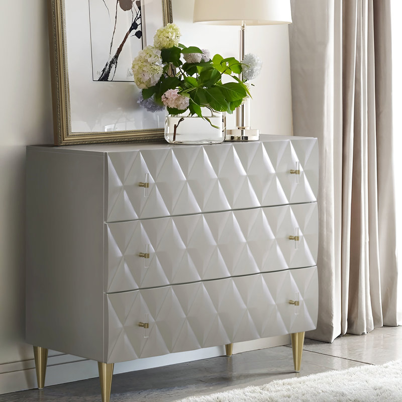 Armoire design avec façade de tiroir et pieds de rangement spacieux avec rangement en feutre argenté