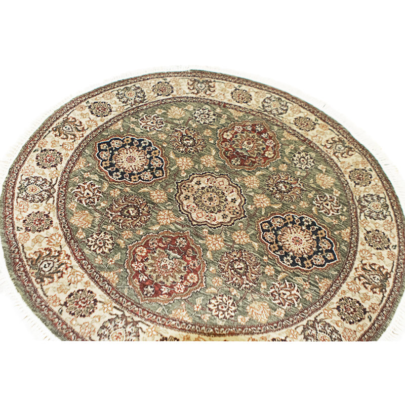 Hand Knotted Wool Area Rug in Green And Cream