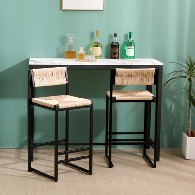 De 2 tabourets de bar Honey, assise en corde de papier. Base en métal, style moderne. Idéal pour un îlot de cuisine et un comptoir. Facile à installer grâce à des intérieurs élégants et élégants