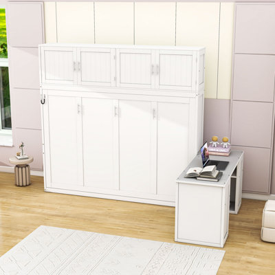 Grand lit escamotable mural avec bureau, armoires de rangement et tablettes