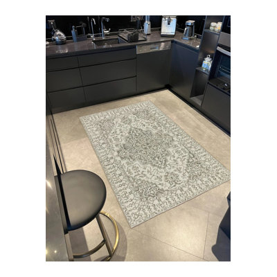 Tapis tissé à motif d'étoile gris