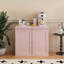 Armoire de rangement polyvalente avec portes doubles, tablettes réglables et finition rose moderne pour un usage multiple