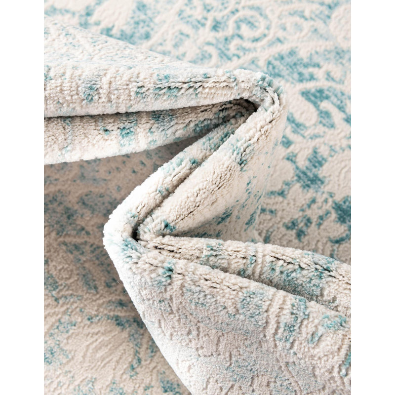 Tapis bleu clair / ivoire Teadora, Rond 4 pi 1 po