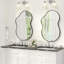 Miroir de salle de bain asymétrique en verre trempé et métal-623786706