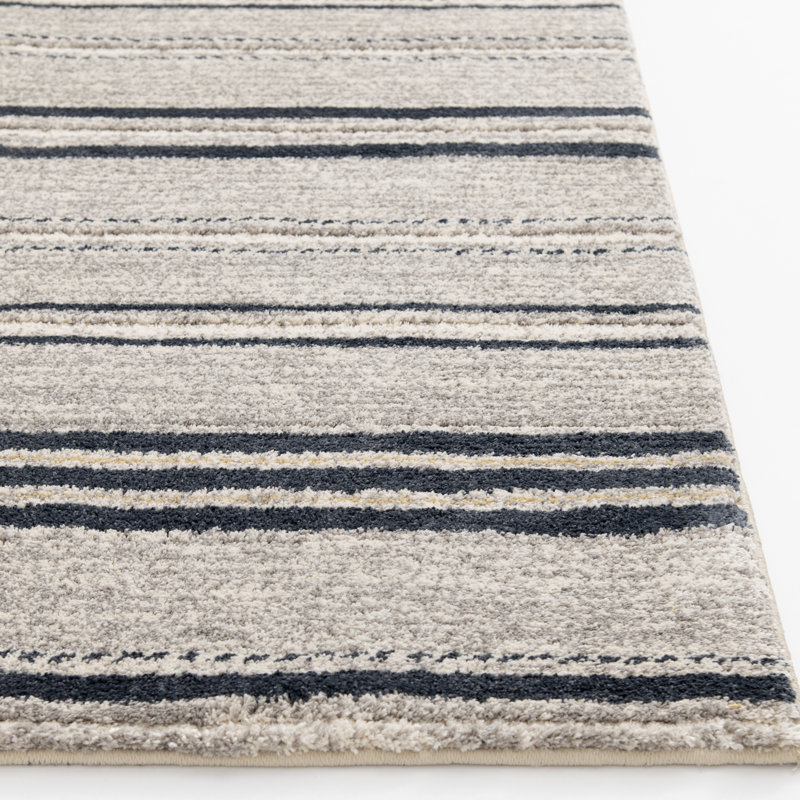 Tapis d'intérieur en polyester beige / noir Bungalow Rose Plath Sartell, Rectangle 4 pi 11,1 po x 7 pi 6,6 po
