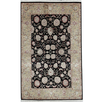 Tapis noir et doré de haute qualité noué à la main