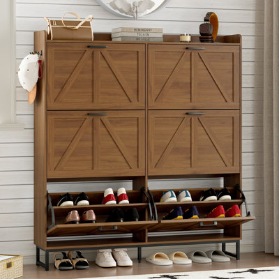 Armoire à chaussures réglable à trois niveaux de grande capacité avec tiroirs rabattables et tablettes amovibles, avec un design minimaliste moderne.