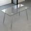 Ensemble de salle à manger pour 4 personnes en verre trempé avec pieds galvanisés argentés et chaises en similicuir, table rectangulaire transparente
