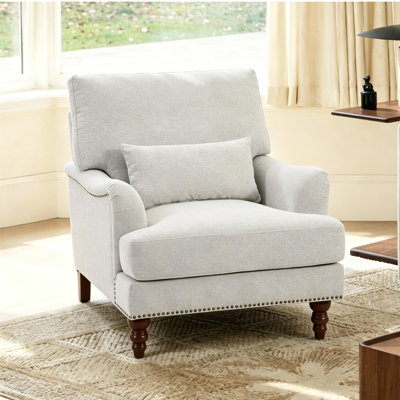 Upholstered Beige Nailhead Trim Accent Chair with Throw Pillow and Solid Wood Legs
