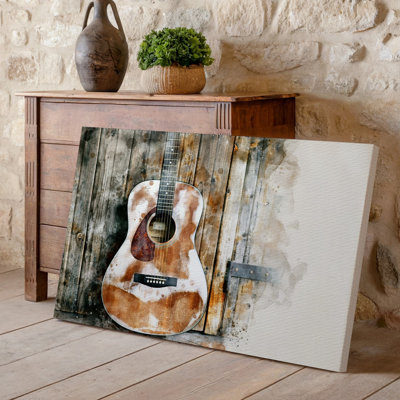 Toile, une magnifique guitare acoustique vieillie repose sur une toile de fond d'art en bois rustique partiellement obscurcie par Soft Watercolor
