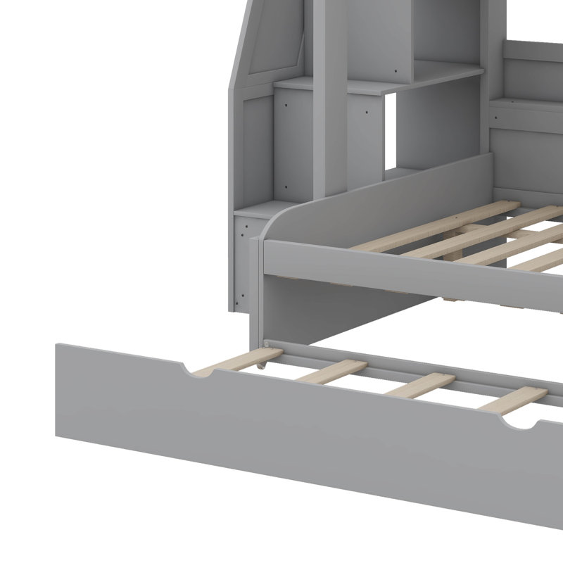 Lit superposé simple au-dessus d'un lit double avec gigogne et marches de rangement, équipé de rails de sécurité pleine longueur, de rangement intégré et de stations de charge USB