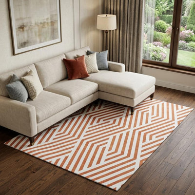 9' X 12' Rust And Ivory Geometric Washable Area Rug With UV Protection