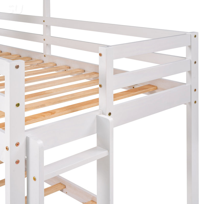 Lit superposé simple au-dessus d'un lit simple en bois