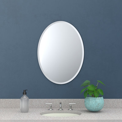 Miroir de salle de bain mural ovale biseauté sans cadre de style moderne