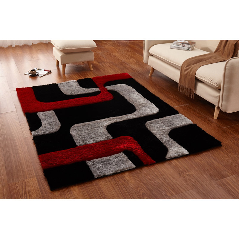 Tapis de zone noire abstraite Regina