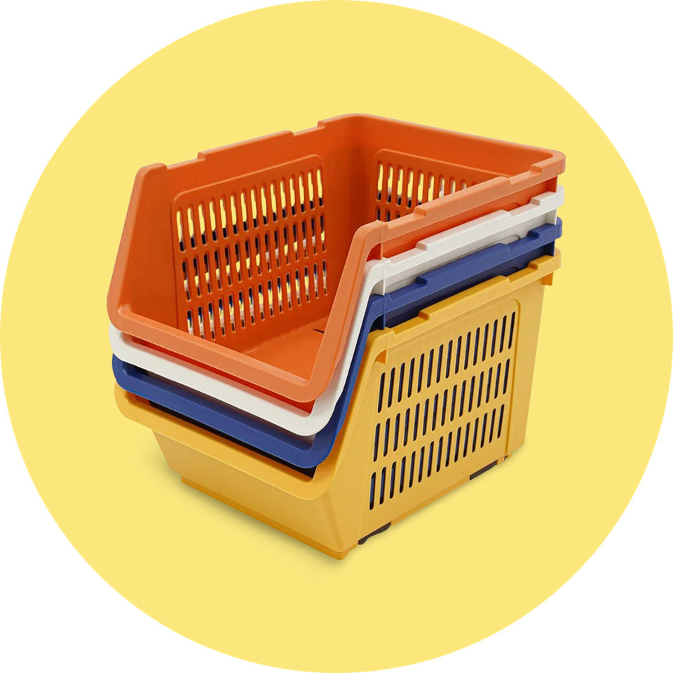A stack of plastic storage bins in orange, white, blue, and yellow against a yellow circular background.