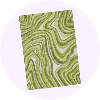 Green and cream swirl pattern area rug