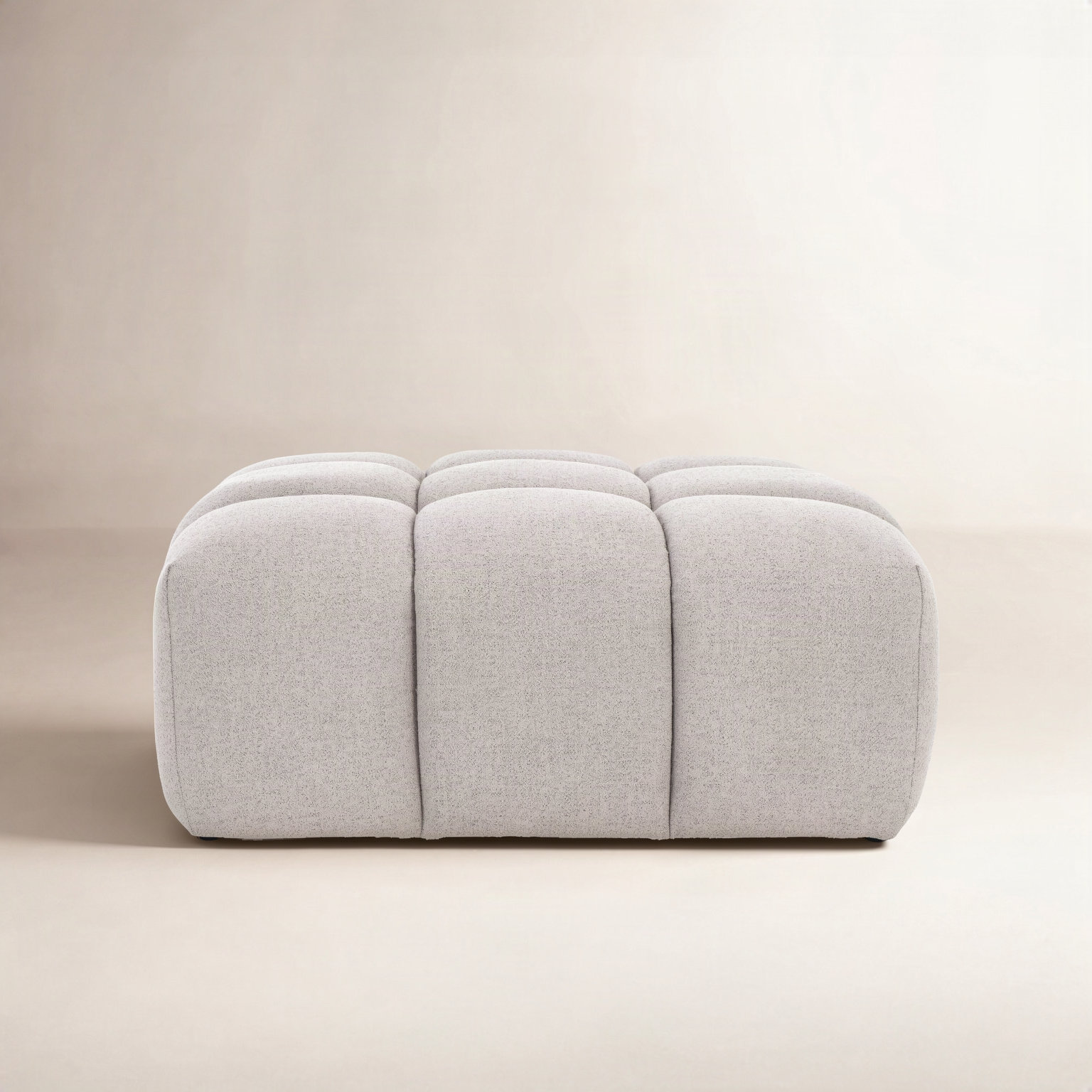 Haring Upholstered Ottoman, Gray Boucle