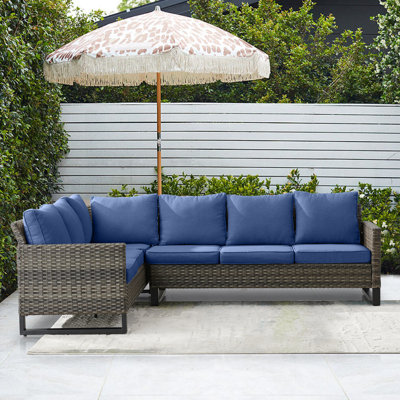 Naresa Wide Outdoor Wicker Patio Sectional with Cushions by Ebern Designs