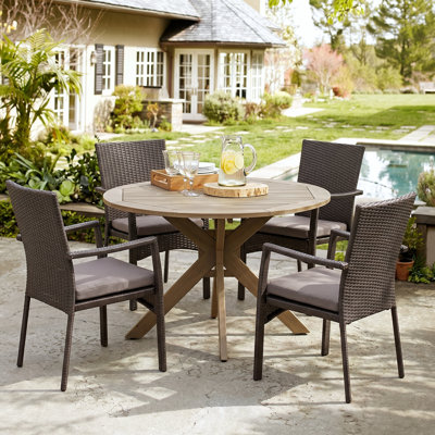 Towler 4 - Person Acacia Wicker Patio Dining Set with Round Table , Cushions Included