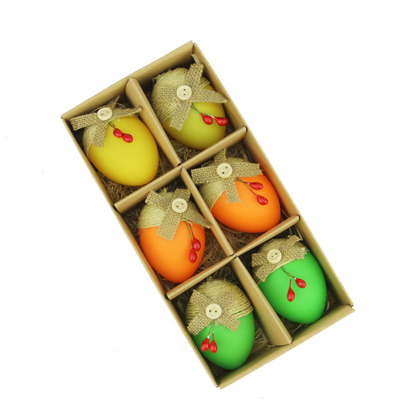 Ornement en forme d'œuf de Pâques vert et jaune en toile de jute