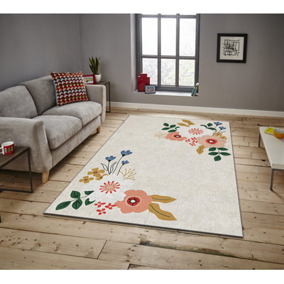 Tapis ivoire rectangulaire en polyester tissé à la machine à motif floral Tavon